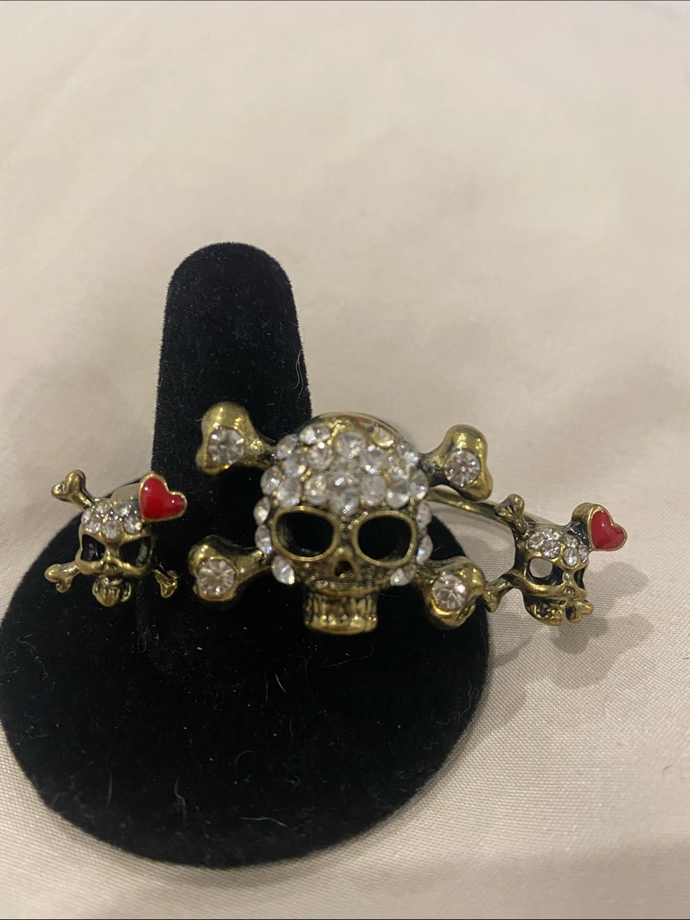 Crystal Skull & Crossbones Brooch with Red Heart Accents. One size